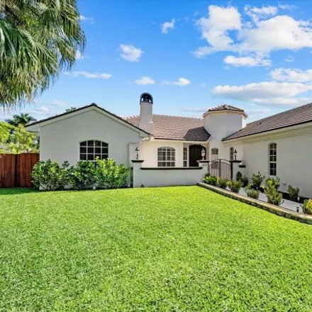 Rent this 4 bed house on 13540 Paddock Drive in Wellington, Palm Beach County
