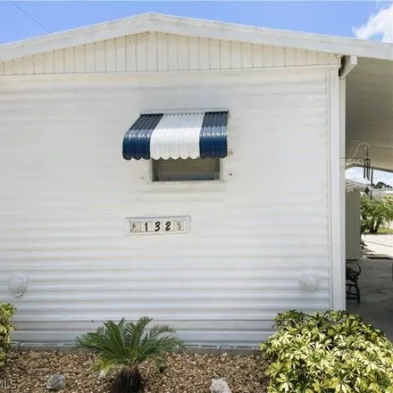 Image 2 - 245 Flame Lane, West Mobile Manor, North Fort Myers, FL 33917, USA - Apartment for sale