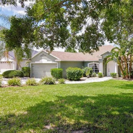 Buy this 4 bed house on 11795 Pineloch Loop in Lake County, FL 34711