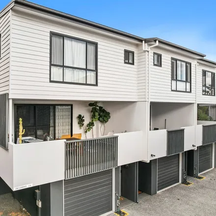 Rent this 3 bed townhouse on 29 Ninth Avenue in Coorparoo QLD 4151, Australia