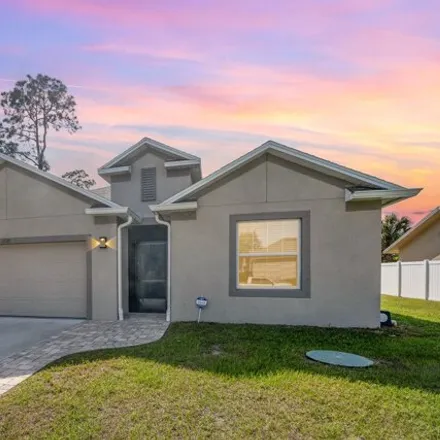Buy this 4 bed house on 1532 Amador Avenue Northwest in Palm Bay, FL 32907