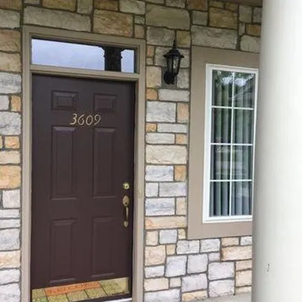 Rent this 2 bed apartment on Silvercreek Boulevard in Oakland Charter Township, MI 48306
