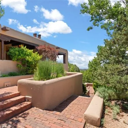 Buy this 3 bed house on 10 Double Arrow Rd Unit A in Santa Fe, New Mexico