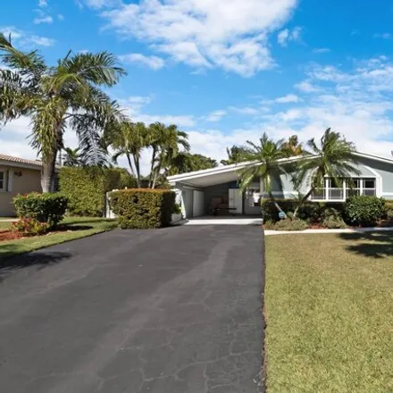 Buy this 3 bed house on 2167 Northeast 55th Street in Coral Ridge Isles, Fort Lauderdale