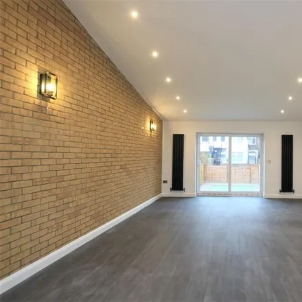 Rent this 4 bed townhouse on 130 Landseer Avenue in London, E12 6HR