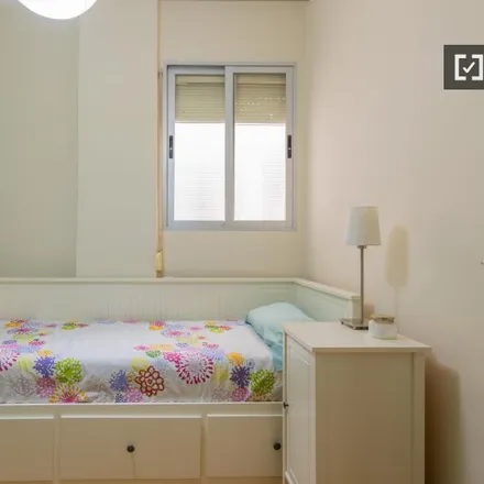 Rent this 2 bed room on Carrer del Vall de Laguar in 12, 46009 Valencia