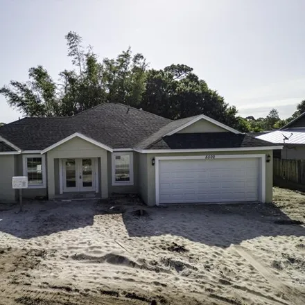 Buy this 4 bed house on 5490 Birch Drive in Indian River Estates, Saint Lucie County