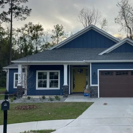 Rent this 4 bed house on 4100 Northwest 26th Drive in Gainesville, FL 32605