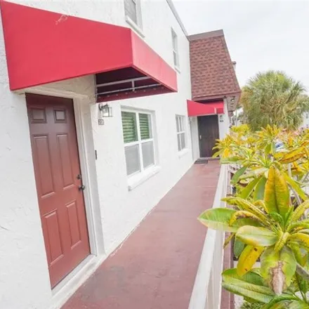 Buy this 2 bed townhouse on 9102 Tudor Drive in Waterfront Estates, Hillsborough County