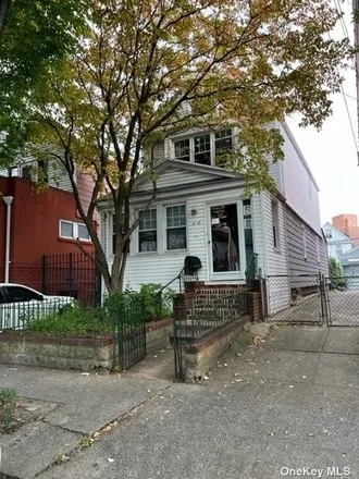 Buy this 3 bed house on 81-30 Dongan Avenue in New York, NY 11373