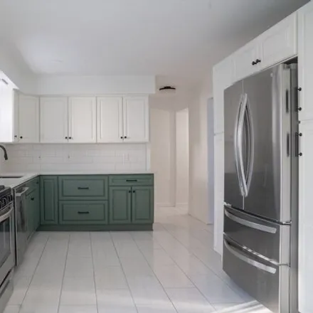 Rent this 4 bed townhouse on 82 McLellan Street in Boston, MA 02121