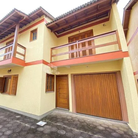 Buy this 4 bed house on Rua Oiampi in Guarujá, Porto Alegre - RS