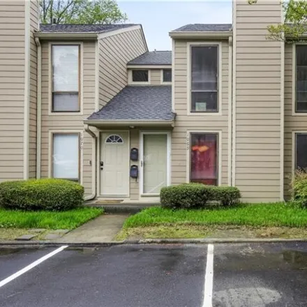 Buy this 2 bed condo on 1142 Riverbend Club Drive Southeast in Cobb County, GA 30339