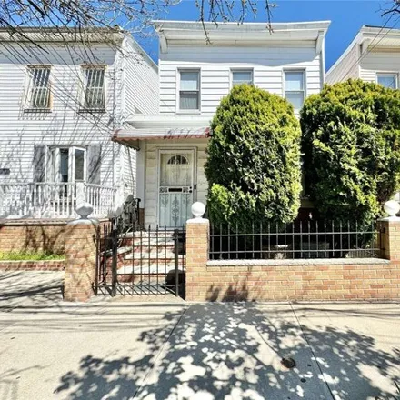 Buy this 5 bed house on 88-43 75th Street in New York, NY 11421