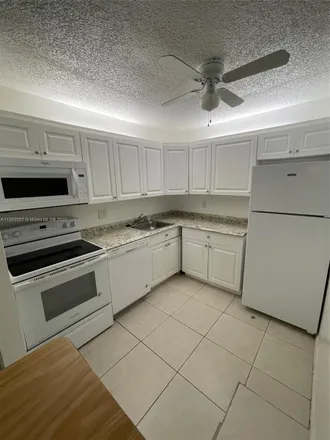 Buy this 2 bed condo on 10741 West Clairmont Circle in Tamarac, FL 33321
