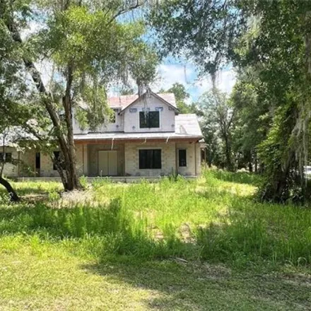 Buy this 4 bed house on 1913 Hillcrest Oak Drive in DeLand, FL 32720