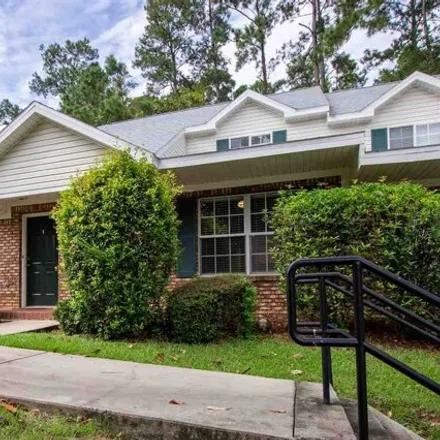 Rent this 3 bed condo on 2700 Pecan Road in Tallahassee, FL 32303