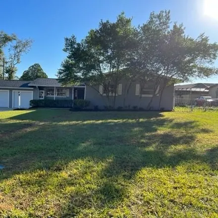 Buy this 3 bed house on 1821 Northeast 50th Avenue in Ocala, FL 34470