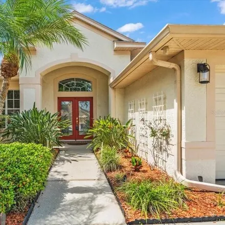 Buy this 4 bed house on 22874 Bay Cedar Drive in Land O' Lakes, FL 34639