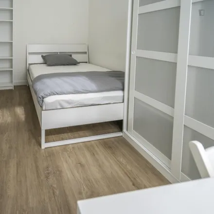 Rent this 3 bed room on Monet Garden Hotel in Valkenburgerstraat, 1011 NB Amsterdam