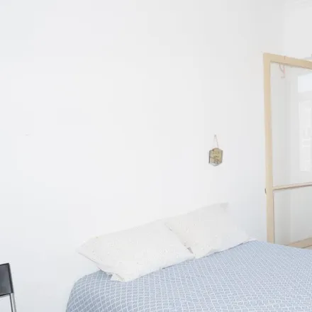 Rent this 2 bed room on Rua Professor Lima Basto in 1070-091 Lisbon, Portugal