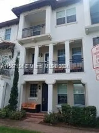Rent this 3 bed townhouse on 11957 Southwest 26th Court