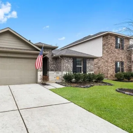 Rent this 4 bed house on Strong Horse Drive in Conroe, TX 77301