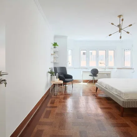 Rent this 7 bed room on Avenida Luís Bívar 36 in 1050-000 Lisbon, Portugal