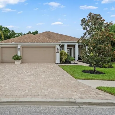 Buy this 4 bed house on 543 Honeyflower Loop in Bradenton, Florida