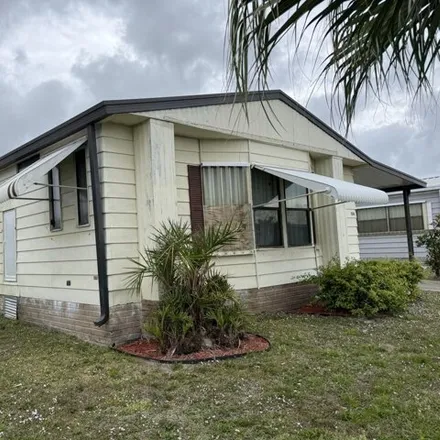 Buy this studio apartment on 622 Seagull Drive in Brevard County, FL 32976