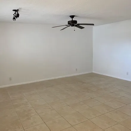 Rent this 2 bed apartment on 21 Date Palm Drive in Lake Park, Palm Beach County