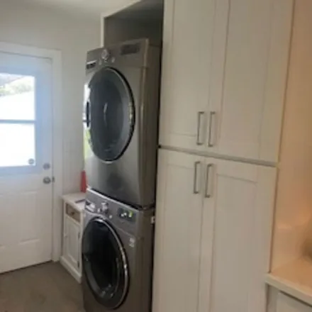 Rent this 3 bed apartment on 6308 South Harcourt Avenue in Los Angeles, CA 90043
