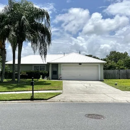 Buy this 4 bed house on 241 McClain Dr in West Melbourne, Florida
