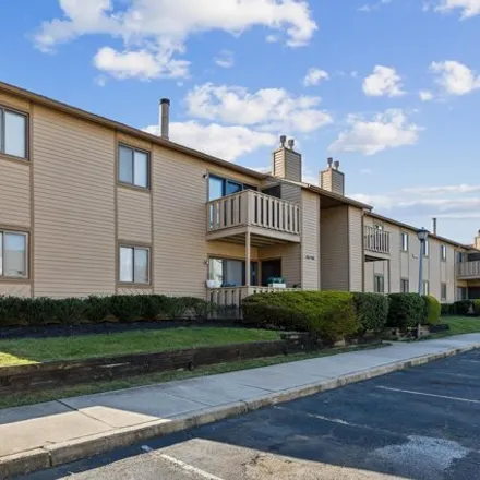 Buy this 2 bed condo on 1612 Woodhollow Drive in Greentree Village, Evesham Township