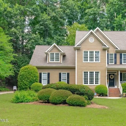 Buy this 5 bed house on 5208 Sunset Ln in Holly Springs, North Carolina