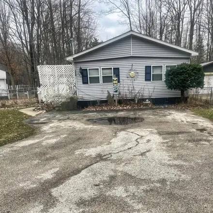 Buy this studio apartment on 286 Mink Drive in Gerrish Township, MI 48653