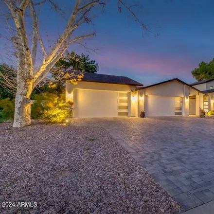 Buy this 4 bed house on 5020 East Pershing Avenue in Scottsdale, AZ 85254
