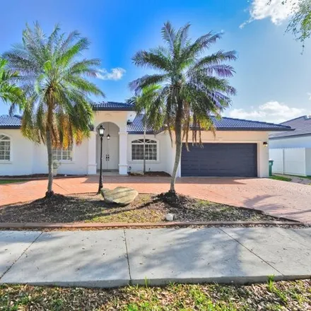 Rent this 4 bed house on 7790 Northwest 162nd Terrace in Miami Lakes, FL 33016