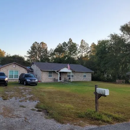 Buy this 4 bed house on 18528 Bert Dedeaux Road in Harrison County, MS 39574