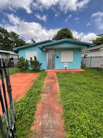 Buy this 3 bed house on 1847 NW 63rd St in Miami, Florida