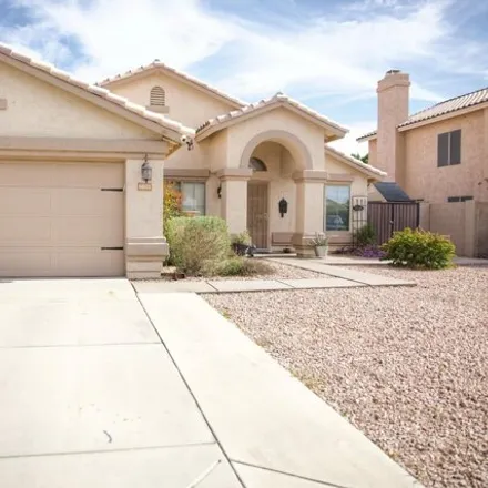 Rent this 4 bed house on 8021 West Rue de Lamour in Peoria, AZ 85381