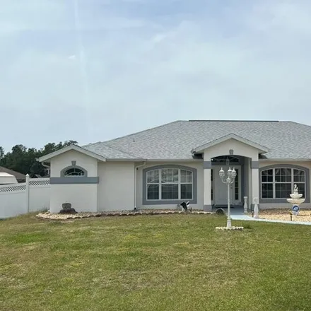 Buy this 3 bed house on 10862 Southwest 47th Avenue in Marion County, FL 34476