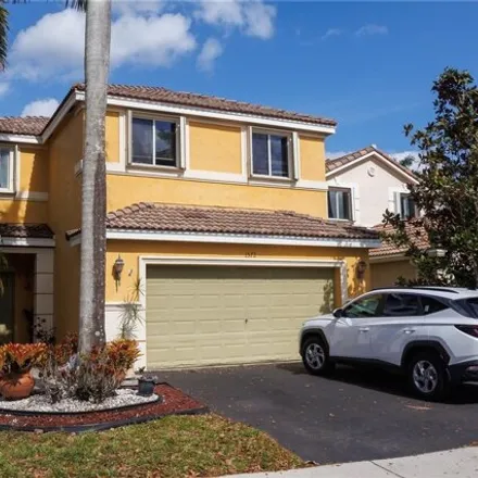 Rent this 4 bed house on 1572 Canary Island Drive in Weston, FL 33327