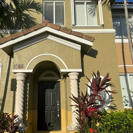 Rent this 3 bed townhouse on 1065 Southeast 23rd Avenue in Homestead, FL 33035