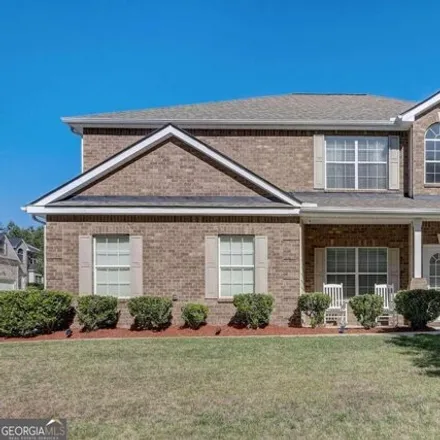 Buy this 4 bed house on 7519 Willow Leaf Trail in DeKalb County, GA 30058