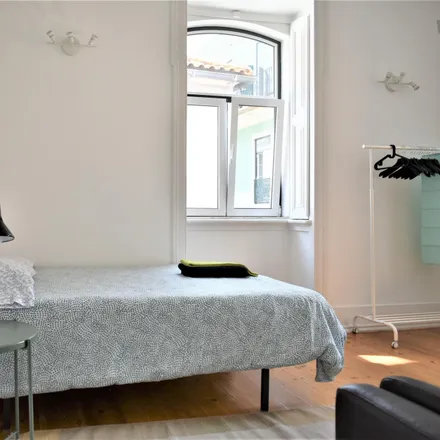 Rent this 5 bed room on Rua da Rosa 151 in 1200-249 Lisbon, Portugal