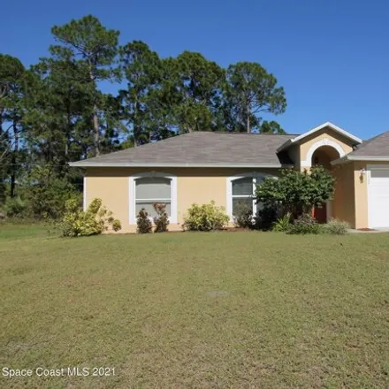Rent this 3 bed house on 1729 Holbrook Road Northwest in Palm Bay, FL 32907
