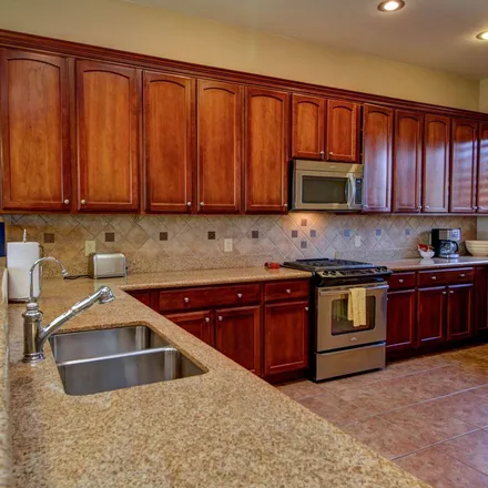Rent this 3 bed apartment on 11411 North Moon Ranch Place in Marana, AZ 85658