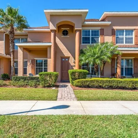 Buy this 2 bed townhouse on 228 Airport Road in South Village, New Smyrna Beach