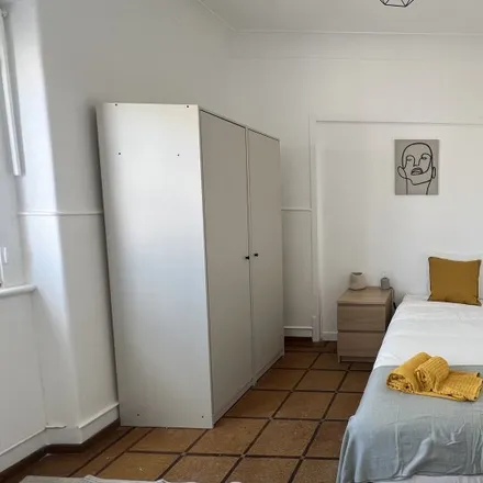 Rent this 9 bed room on Rua António Gonçalves in 1900-462 Lisbon, Portugal